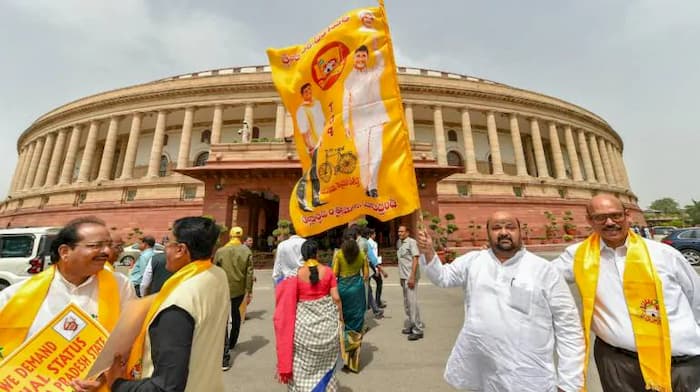 Maganti Babu holding TDP Flag at the Parliament