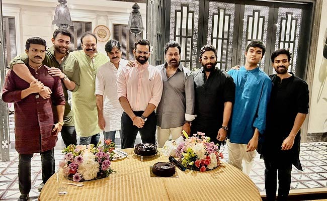 Sai Dharam Tej Springs A Surprise Poses With Mega Star And Other Family Heroes